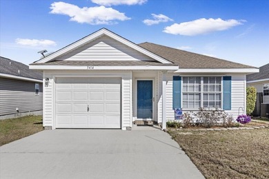Welcome to this inviting and well-maintained Shadow Lakes patio - photo 1
