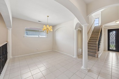 Located in the gated community of Lakeside Village, this - photo 2