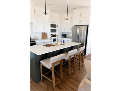 Completed in 2024, this beautifully crafted home offers the - photo 17