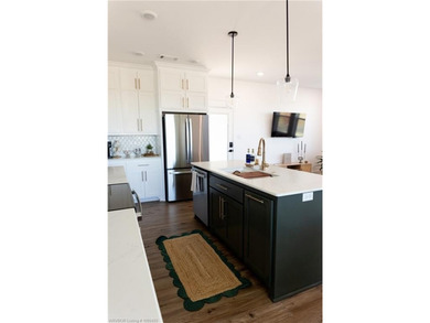 Completed in 2024, this beautifully crafted home offers the - photo 19