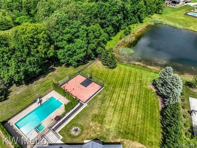 Set on a quiet cul-de-sac in one of Ray Township's most - photo 20