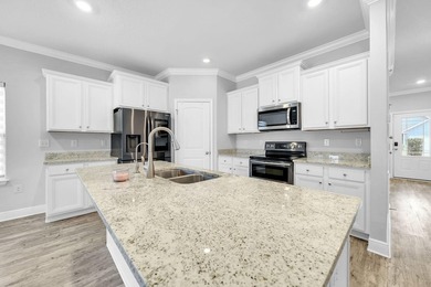 ASSUMABLE MORTGAGE RATE OF 3.25% AVAILABLE! Newer-Built - photo 3