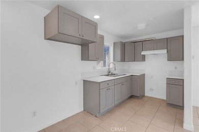 This well-maintained duplex offers two units under one roof - photo 11
