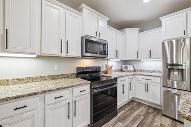 Love to entertain? This beautifully updated home in the gated - photo 13