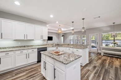 Love to entertain? This beautifully updated home in the gated - photo 14