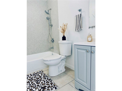 This well-maintained duplex offers two units under one roof - photo 15