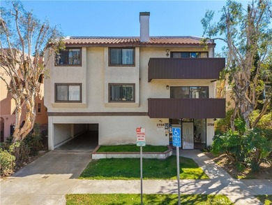 Just two short blocks from the sand, this inviting coastal condo - photo 3