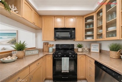 Just two short blocks from the sand, this inviting coastal condo - photo 9