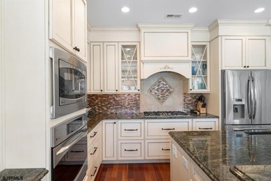 Nestled in the Prestigious GARDENS community, this extraordinary - photo 13
