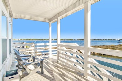 124 Sand Dune Lane is a COASTAL, WATERFRONT BEAUTY! The home's - photo 3