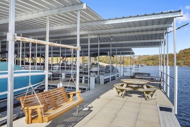 Welcome to an extraordinary lakefront estate in the prestigious - photo 16