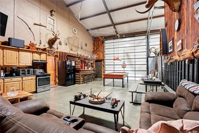 Experience luxury lake living in this expansive log-style - photo 16