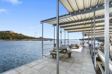 Welcome to an extraordinary lakefront estate in the prestigious - photo 17
