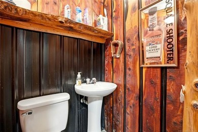 Experience luxury lake living in this expansive log-style - photo 17