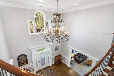 Welcome to an extraordinary lakefront estate in the prestigious - photo 22