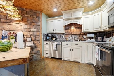 Experience luxury lake living in this expansive log-style - photo 25
