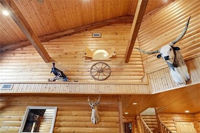 Experience luxury lake living in this expansive log-style - photo 35
