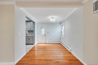 Welcome to this beautifully renovated 6-bedroom, 2-bath Colonial - photo 6