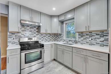 Welcome to this beautifully renovated 6-bedroom, 2-bath Colonial - photo 9