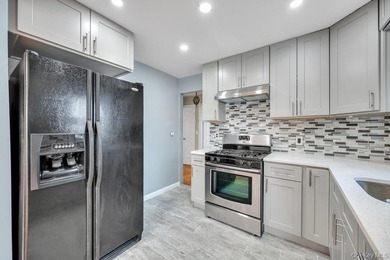 Welcome to this beautifully renovated 6-bedroom, 2-bath Colonial - photo 10