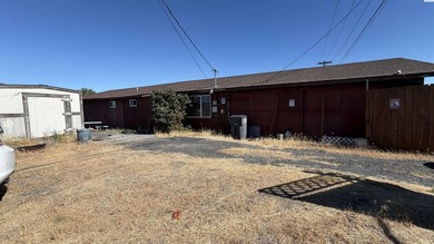 MLS# 294616 Welcome to this inviting 3-bedroom, 2-bath home in - photo 1