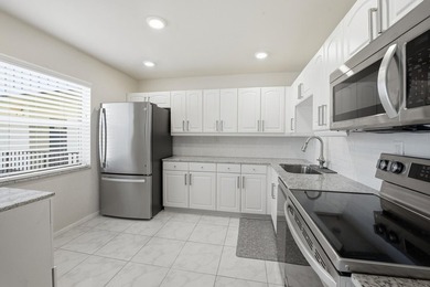 Step into this deluxe, completely renovated model featuring an - photo 15