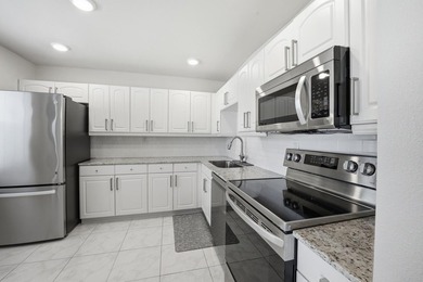 Step into this deluxe, completely renovated model featuring an - photo 16