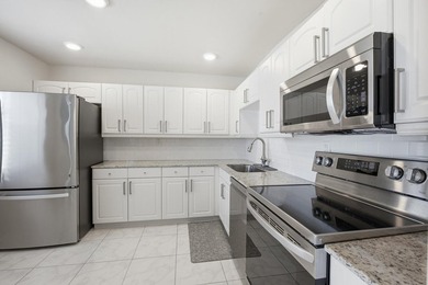 Step into this deluxe, completely renovated model featuring an - photo 17