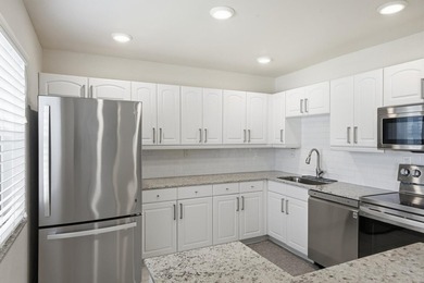 Step into this deluxe, completely renovated model featuring an - photo 18
