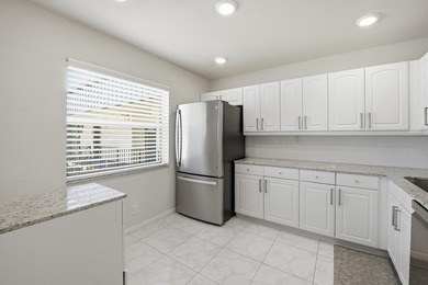 Step into this deluxe, completely renovated model featuring an - photo 19