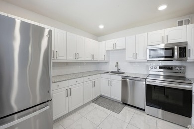 Step into this deluxe, completely renovated model featuring an - photo 20