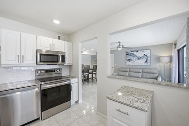 Step into this deluxe, completely renovated model featuring an - photo 21