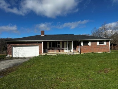 Tucked away on a beautiful 6-acre parcel, this charming - photo 1