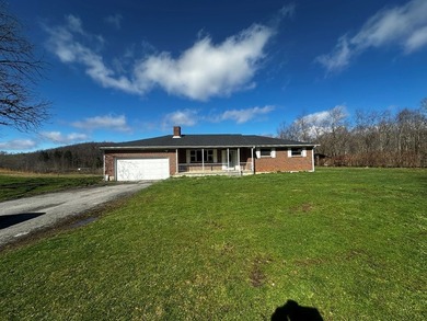 Tucked away on a beautiful 6-acre parcel, this charming - photo 2