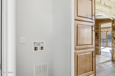 Tucked among the peaceful pines of Airpine, AZ, this remodeled