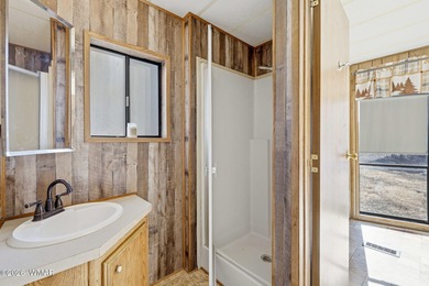 Tucked among the peaceful pines of Airpine, AZ, this remodeled