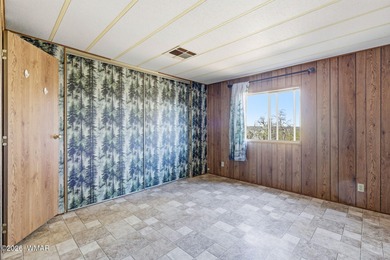 Tucked among the peaceful pines of Airpine, AZ, this remodeled