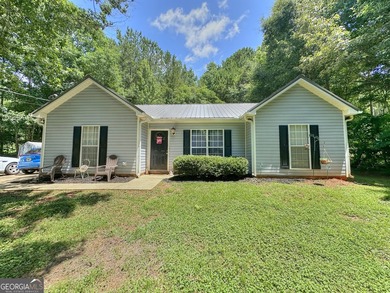 Welcome home to this charming 3-bedroom, 2-bath ranch nestled in - photo 1