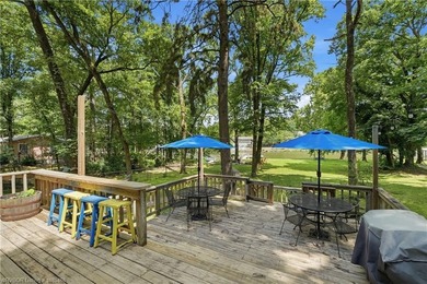 Tucked away along the shoreline of Lake Hamilton in a peaceful - photo 32
