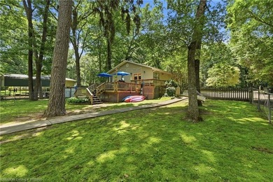 Tucked away along the shoreline of Lake Hamilton in a peaceful - photo 34