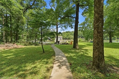 Tucked away along the shoreline of Lake Hamilton in a peaceful - photo 35
