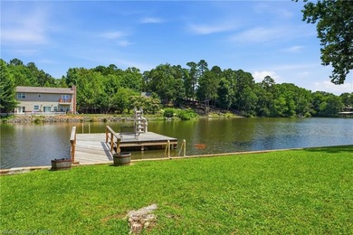 Tucked away along the shoreline of Lake Hamilton in a peaceful - photo 39