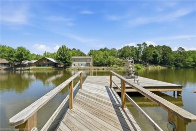 Tucked away along the shoreline of Lake Hamilton in a peaceful - photo 40