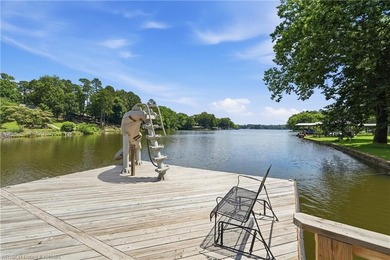 Tucked away along the shoreline of Lake Hamilton in a peaceful - photo 41