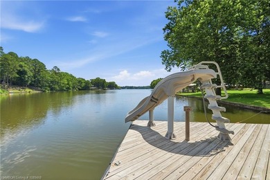 Tucked away along the shoreline of Lake Hamilton in a peaceful - photo 42