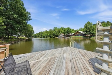Tucked away along the shoreline of Lake Hamilton in a peaceful - photo 43