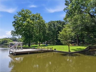 Tucked away along the shoreline of Lake Hamilton in a peaceful - photo 44