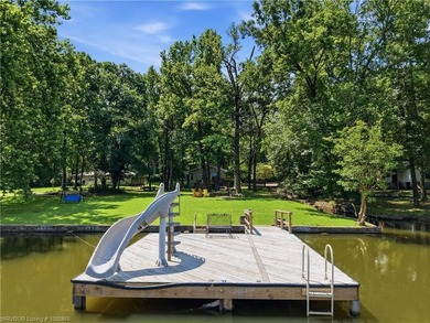 Tucked away along the shoreline of Lake Hamilton in a peaceful - photo 45