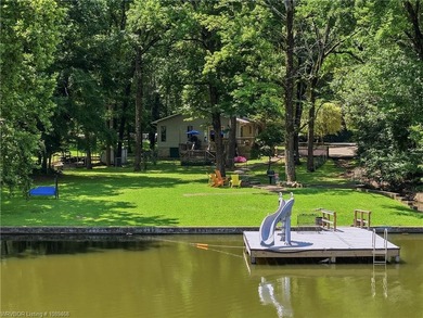 Tucked away along the shoreline of Lake Hamilton in a peaceful - photo 46