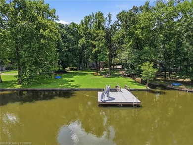 Tucked away along the shoreline of Lake Hamilton in a peaceful - photo 47